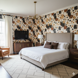 Patterned wallpaper with black and brown blots, textured finish.