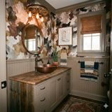 Brindle Quarry wallpaper with mottled, earthy tones, resembling a hide pattern, textured with brown wood trim and vintage-style fixtures.