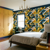 Colorful estuary patterned wallpaper featuring yellow, blue, and green abstract shapes.
