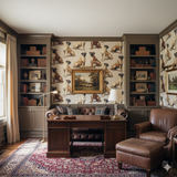 Dog patterned Kingdom of Sol Wallpaper with a painted landscape and traditional wood furniture.
