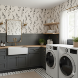 Leafy Inkspire Wallpaper with a black and white botanical pattern on a light background.