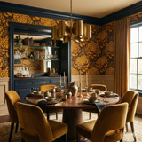 Golden chrysanthemum crest wallpaper with floral pattern over a dark background.