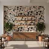 Red Rock Terrazzo Wallpaper with geometric pattern on a light background.
