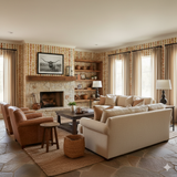 Autumn Plait wallpaper with earth tone pattern, covering the walls of a traditionally decorated living room.
