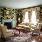 Patterned wallpaper with a dog motif, from Edelweiss Hollow, covering a traditionally decorated living room.