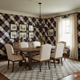 Plaid wallpaper featuring black, white, and burgundy pattern, styled in a dining room.