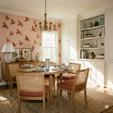 Desert Doves Wallpaper featuring brown bird pattern against a pink background, covering an entire dining room wall.
