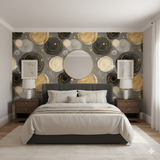 Orrery Wallpaper with gold and black circle pattern on a gray textured background.