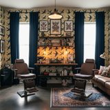 Bird-patterned Skyward Song Wallpaper with blue birds from Anthology, decorating a parlor with dark curtains.