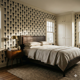 Patterned wallpaper with nail motif by Iron Range Mark, adorning a neutral toned bedroom wall with rug and bed.