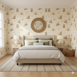 Kalahari Kin Wallpaper with meerkat and grass pattern on a tan background.
