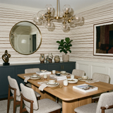 Ticking wallpaper with brown stripes and a linear pattern.