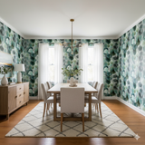 Green leaf print Silverwood Wallpaper with botanical pattern on the walls of a dining room.