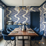 Cobalt drift wallpaper with a swirling blue and white pattern covering the walls of the dining room.
