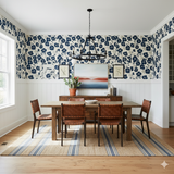 Noctis Bloom wallpaper with a floral pattern, featuring blue flowers against a cream background.