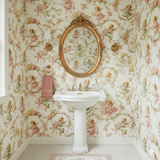 Patterned Chérubin Gala Wallpaper by Schumacher, featuring angels and roses on a white background.
