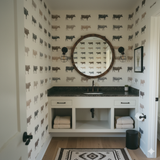 Laramie Row Wallpaper with cow pattern on a neutral background, installed in a powder room.
