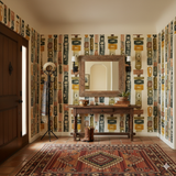 Totem Eye Wallpaper by Wallshoppe, showcasing a totem eye motif in beige, yellow, brown, and black.
