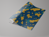 Rolled wallpaper with gilded archipelago pattern on blue background.