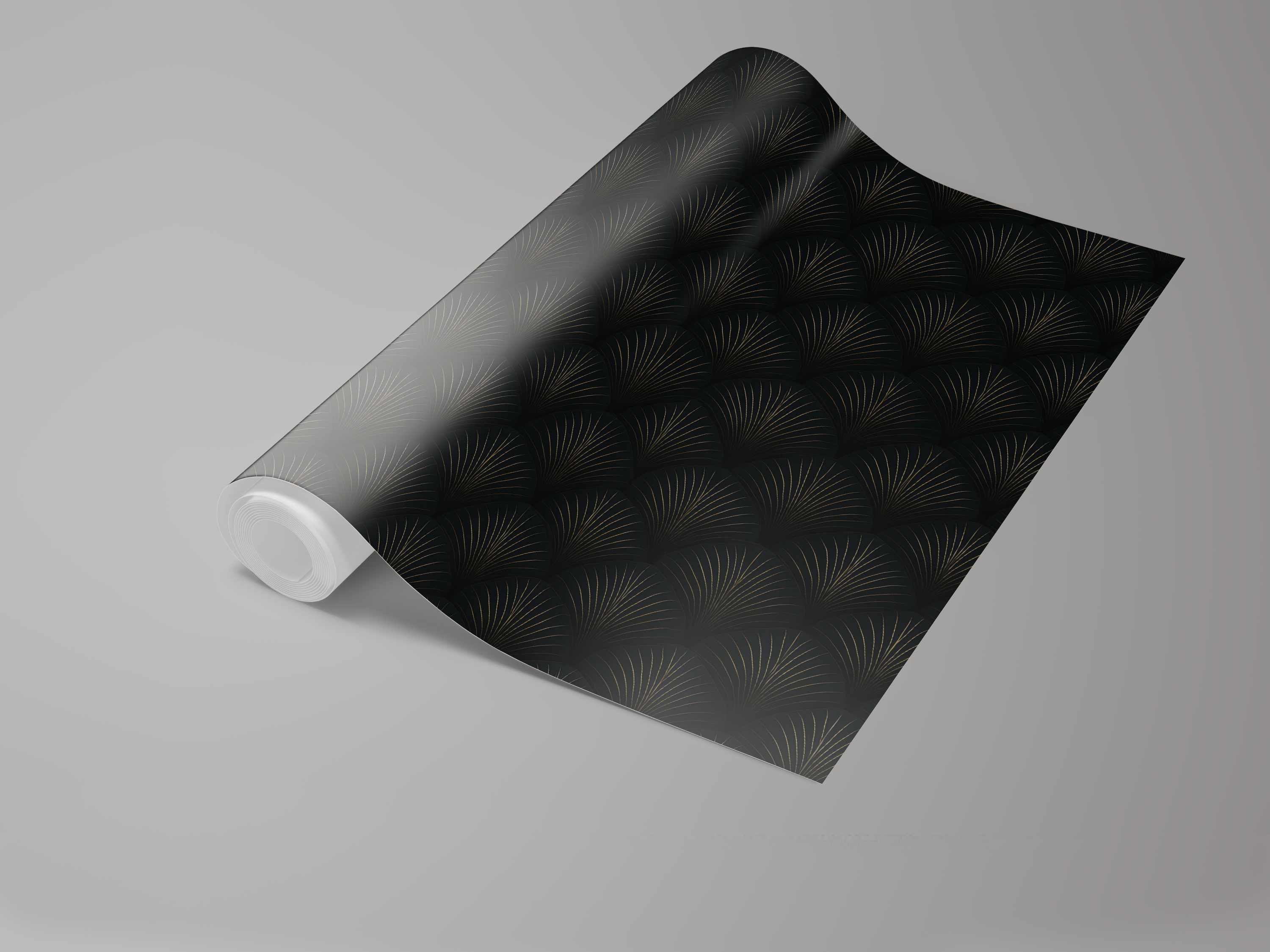 Black and gold wallpaper with gingko leaf pattern, rolled and ready to be installed.