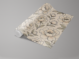 Ink Bloom wallpaper with floral pattern on a roll.