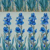 Floral wallpaper with blue iris pattern on light background.