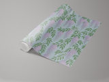Floral patterned wallpaper with purple wisteria design on a light blue background.