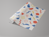 Modern Memphis wallpaper with geometric pattern on a roll.