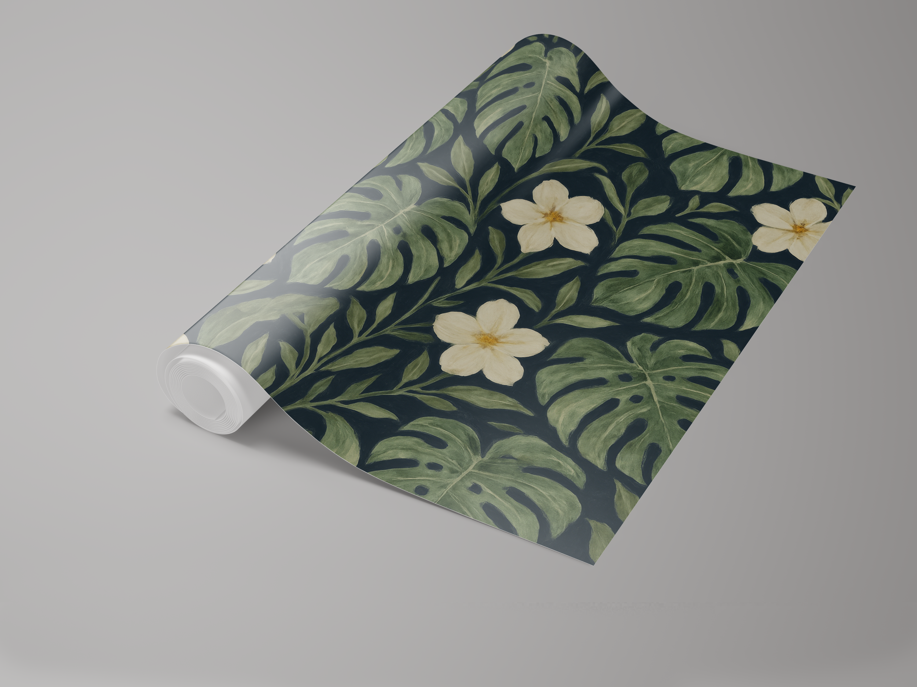 Botanical Monstera Noire Wallpaper with monstera leaf and flower pattern on a roll.