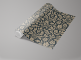 Floral wallpaper by Noble Laurel with a dark blue background and light brown floral design.