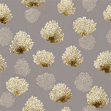 Patterned wallpaper with gold reefburst designs on a gray backdrop.