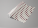 Striped wallpaper with oxblood lines by unknown vendor, rolled on a gray surface.