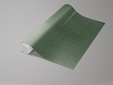 Pine linen wallpaper by Brewster is rolled and textured.