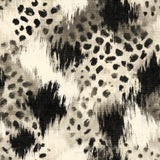 Neutral tone animal print wallpaper with texture details from Brewster Wallcovering.