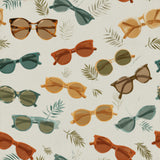 Sunglasses patterned wallpaper with palm leaves.
