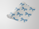 Bluebell Bows Wallpaper with a light blue pattern on a white background.