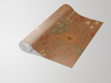 Brown floral wallpaper with cactus print from an unbranded source, rolled up on a white surface.