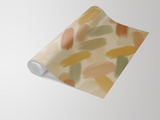 Painter’s Palette wallpaper with brushstroke pattern in tan, brown, and green hues.