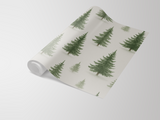 Pine trees wallpaper with green tree pattern on a roll.