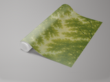 Green sunlit canopy wallpaper by MuralsWallpaper featuring an impressionistic leafy tree pattern.