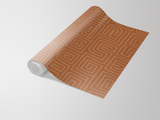 Terra Maze Wallpaper with brown geometric maze pattern.