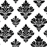 Blackwell Cartouche Wallpaper with a flourished black and white damask pattern.