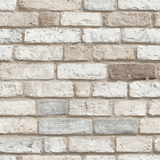 Limestone Lane wallpaper featuring a realistic brick design in mixed white, tan and grey hues.
