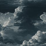 Blue-gray nocturne cumulus wallpaper with a stormy sky and ethereal clouds.