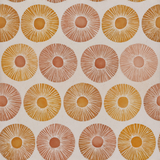Patterned wallpaper with yellow and brown radial designs.