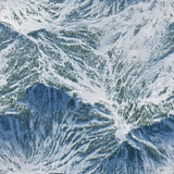 Textured lone peak vista wallpaper with white and green mountain pattern.
