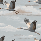 Birds in flight wallpaper featuring a crane pattern and cloud accents.