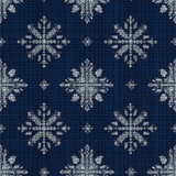 Nordic Hearth Wallpaper with snowflake patterns on a blue textured background.
