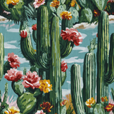 Floral wallpaper with saguaro cactus pattern against a blue sky background.