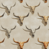 Prairie Reliquary Wallpaper featuring a repeating pattern of various bull skulls on a textured tan background.
